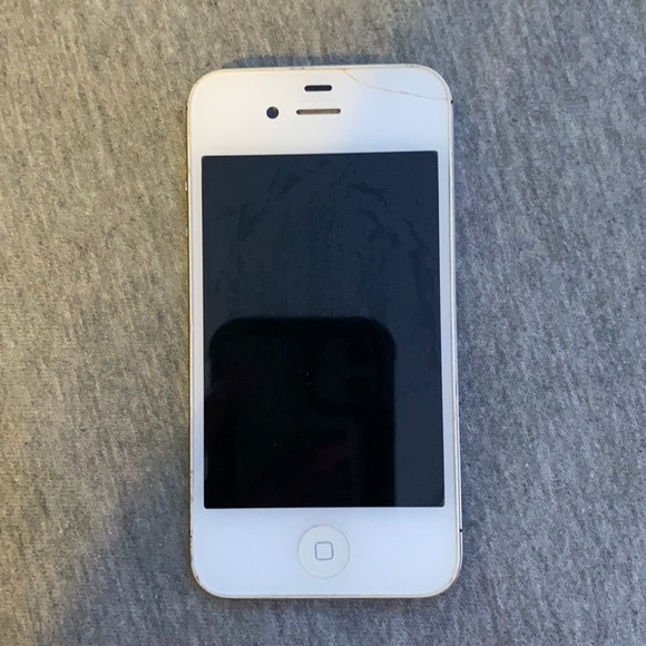Apple Other - iPhone 4. White. Works fine, needs a new back.